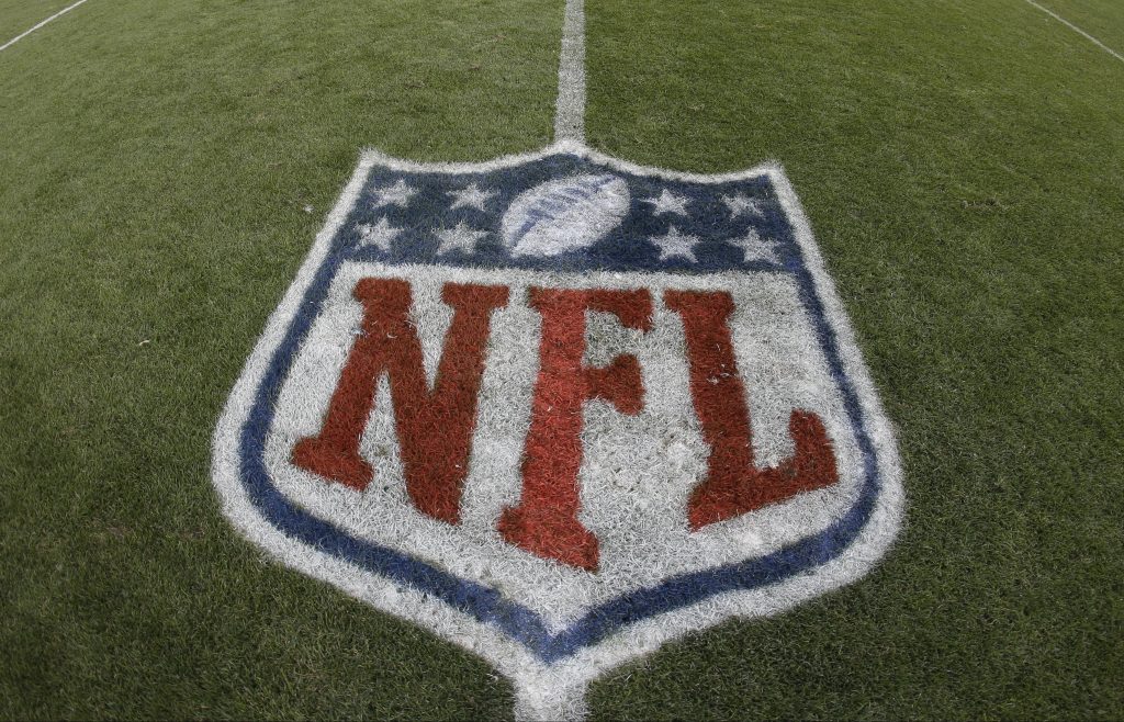 The NFL shield painted on a field