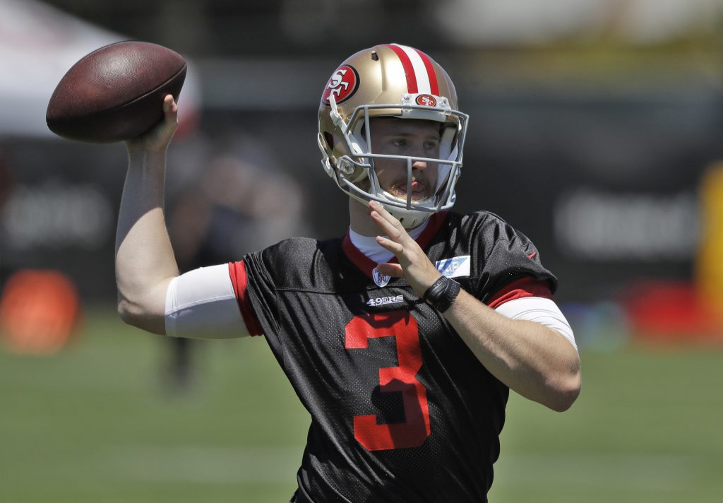 49ers rookie quarterback C.J. Beathard throws a pass during practice