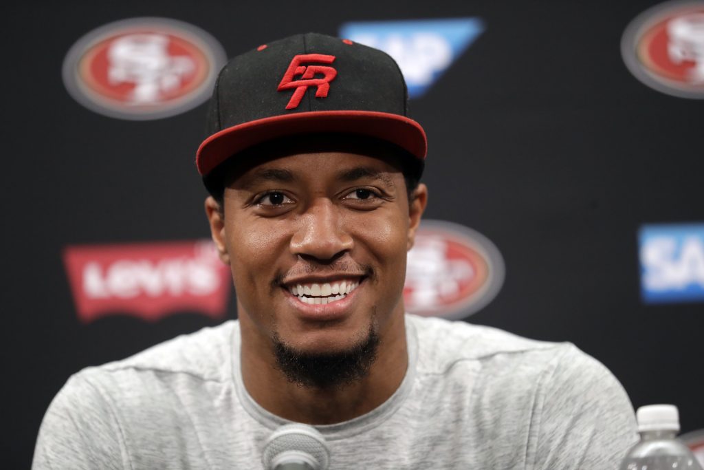 Safety Eric Reid answers questions during 49ers training camp