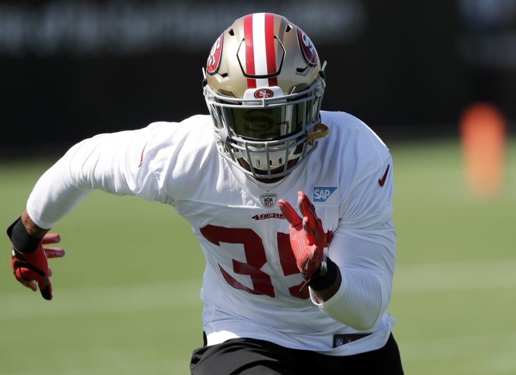 Safety Eric Reid warms up during 49ers training camp