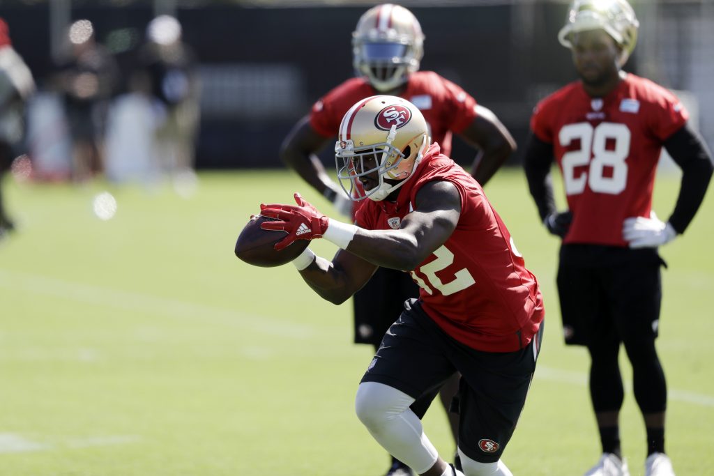 Running back Joe Williams catches a ball during 49ers training camp