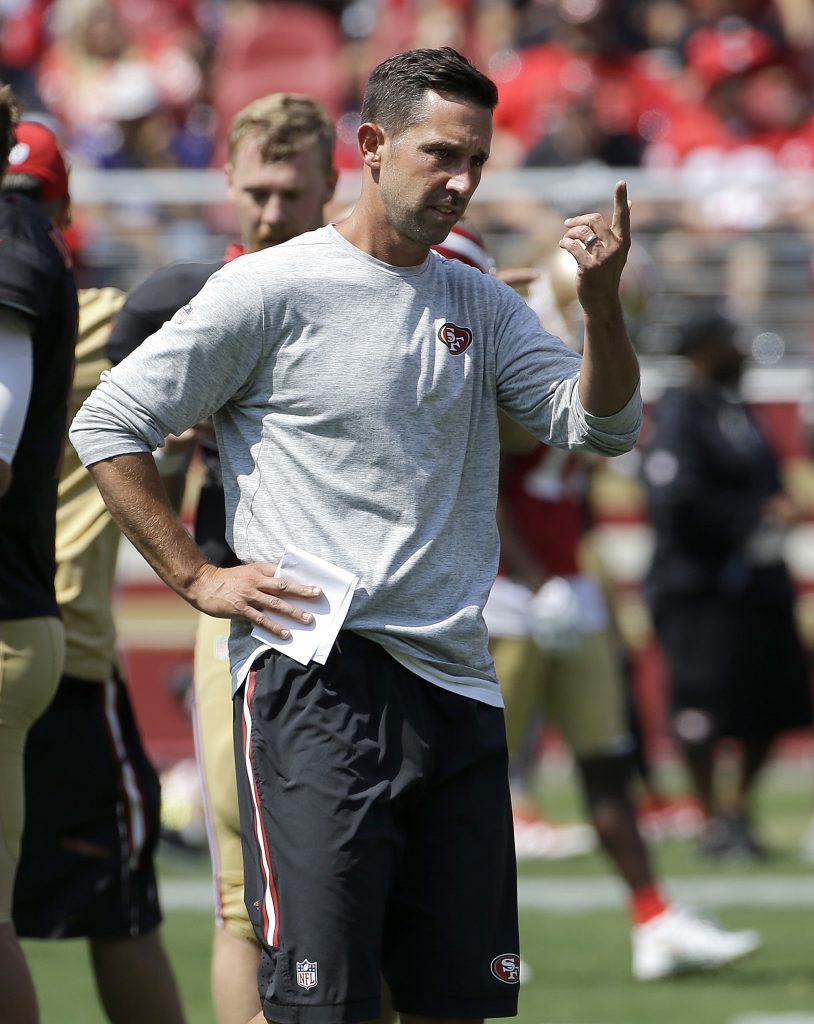 49ers head coach Kyle Shanahan stands on the sideline during practice
