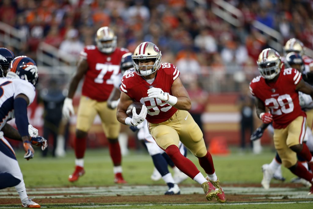Former 49ers tight end Vance McDonald runs with the ball