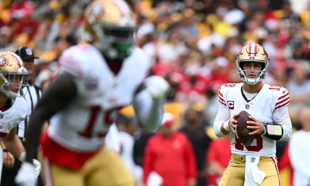 49ers take NFC West lead with 30-23 win over Rams; 5 Burning